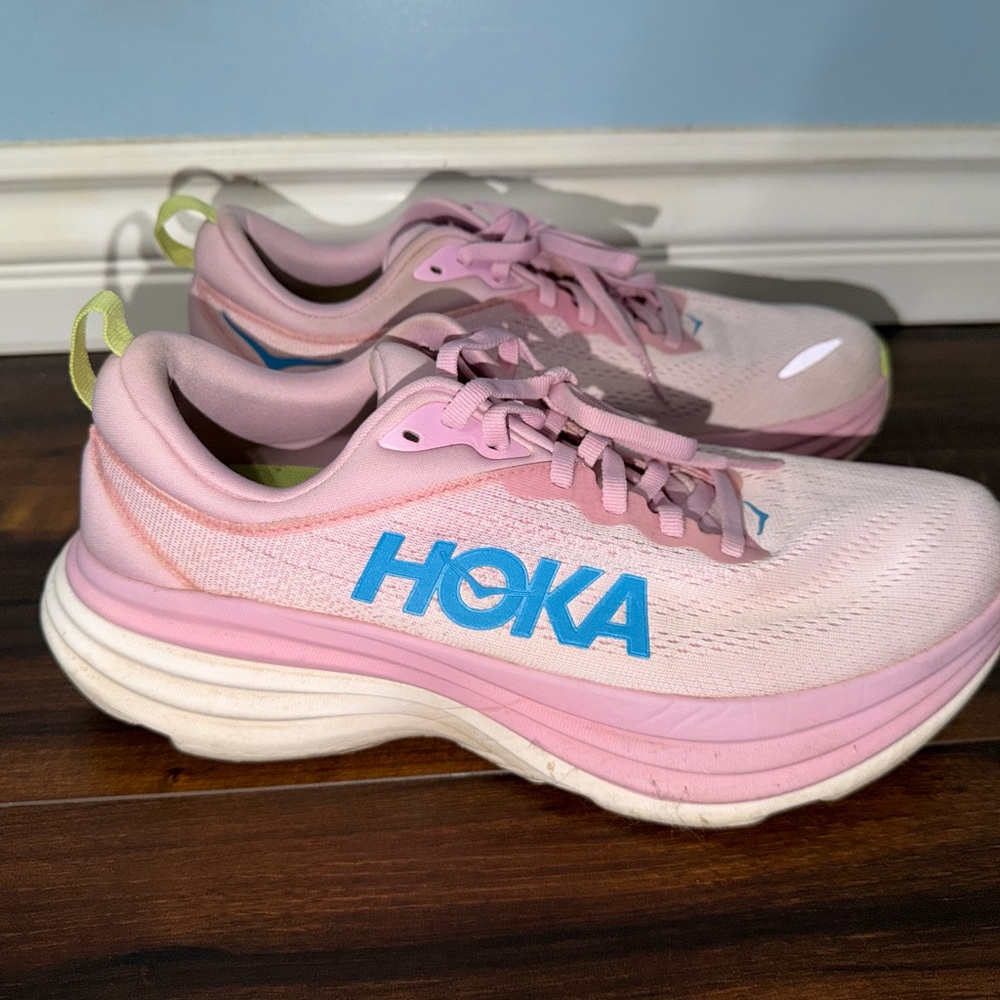 Hoka Pink Running Shoes with Blue Logo and Neon Accents